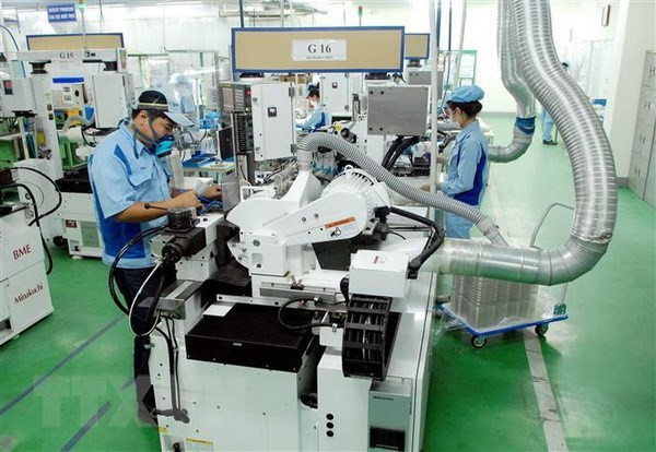 Dây chuyền sản xuất linh kiện cho các sản phẩm điện tử tại Công ty TNHH INOAC Viet Nam (vốn đầu tư của Nhật Bản) tại Khu công nghiệp Quang Minh (Hà Nội) - Ảnh: Danh Lam/TTXVN