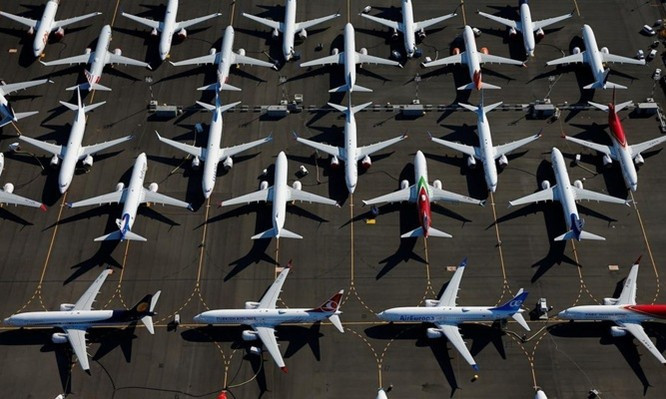 Những chiếc máy bay 737 Max bị đình bay được cất ở Boeing Field, Seatle, Mỹ - Ảnh: Reuters