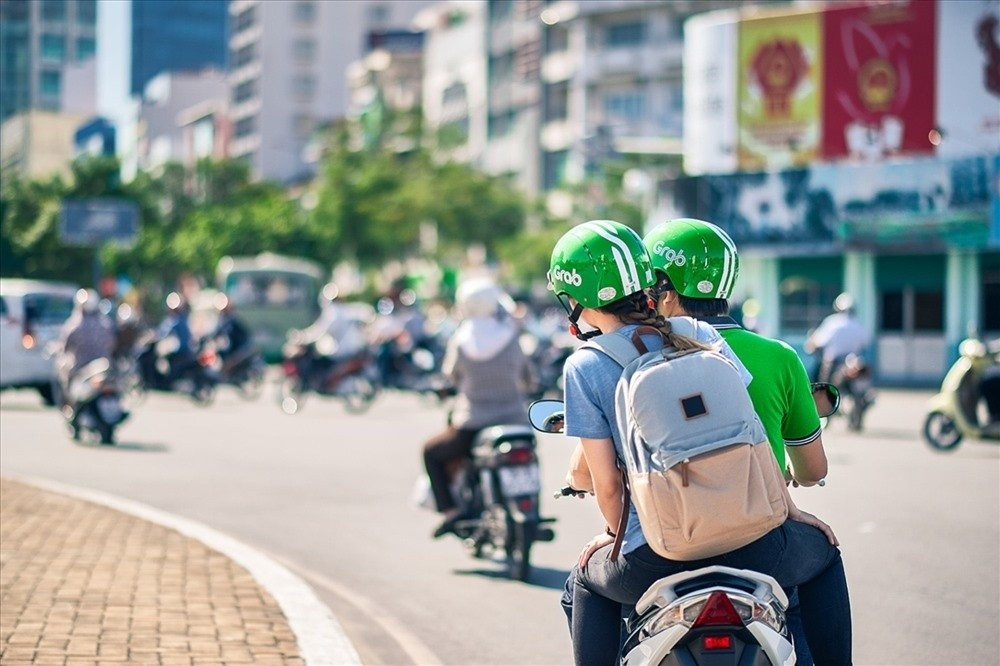 Sở GTVT TP.Hồ Chí Minh phối hợp với Công ty Grab Việt Nam phát triển các dịch vụ vận tải công cộng hiện đại, thân thiện với môi trường - Ảnh minh họa