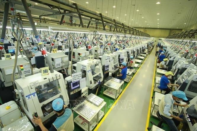 Dây chuyền sản xuất linh kiện điện tử tại Công ty TNHH Bokwang Vina (Khu công nghiệp Điềm Thụy, tỉnh Thái Nguyên). Ảnh: TTXVN
