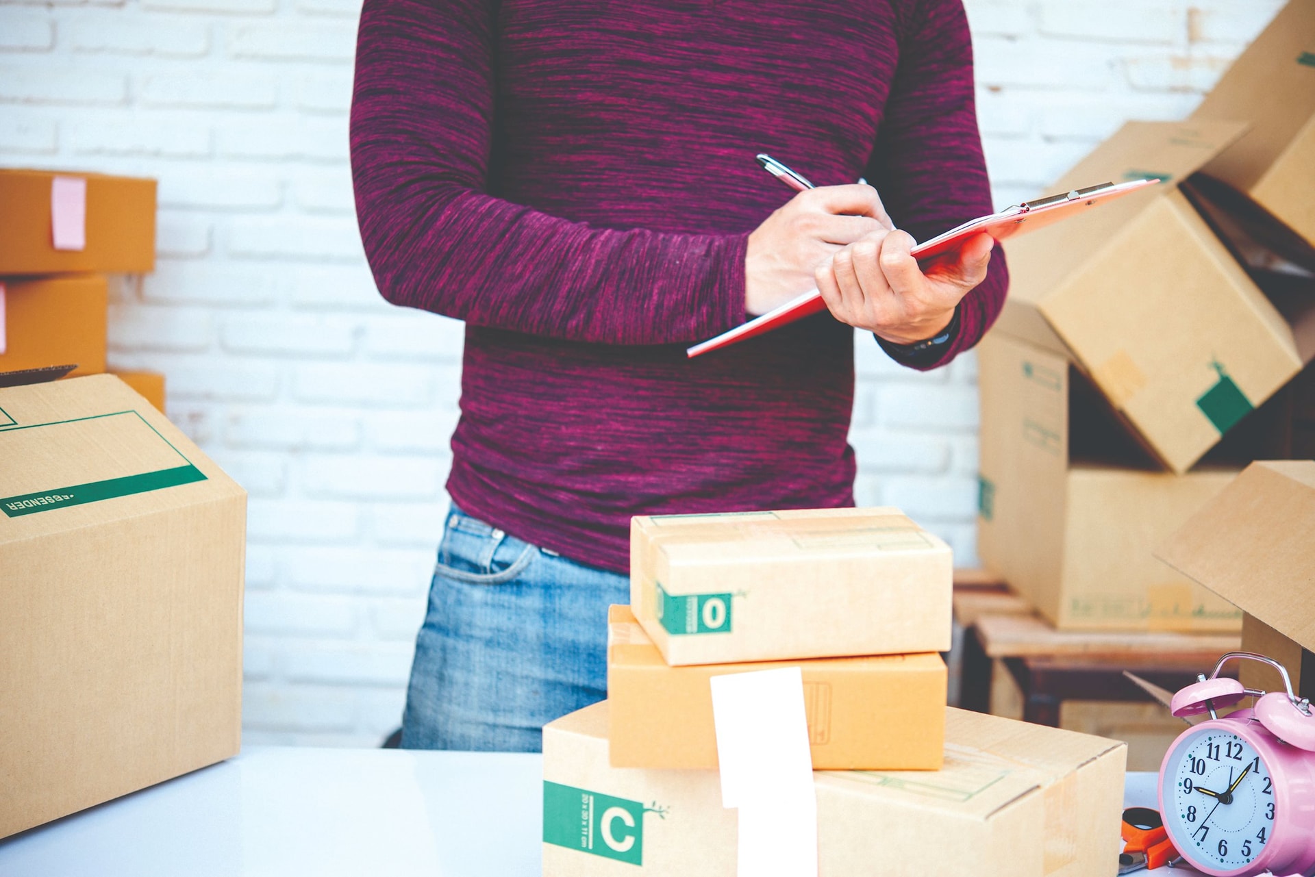 handsome-young-man-working-with-papers-compressed.jpg