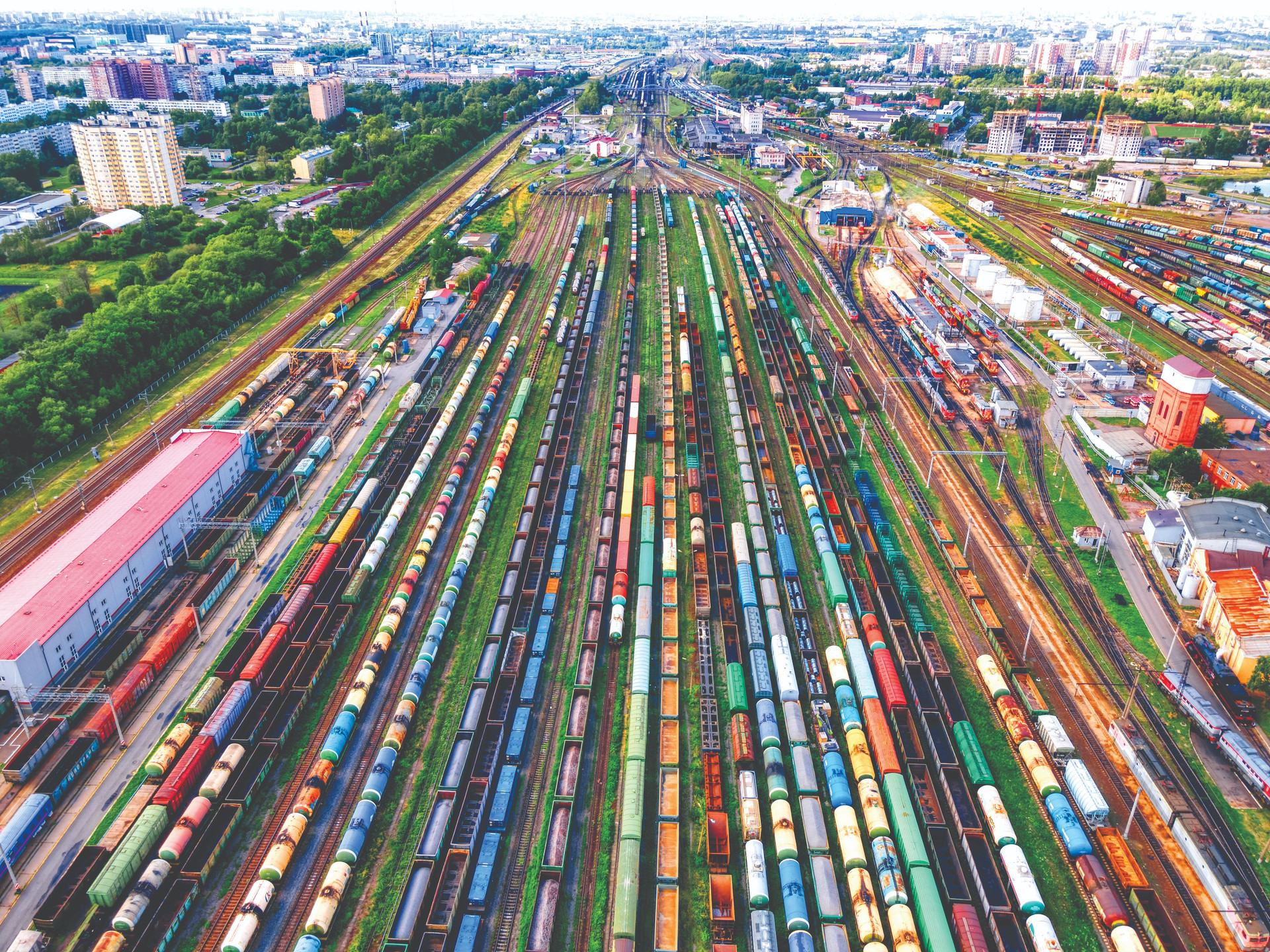 aerial-top-view-railways-with-cargo-wagons-transportation-various-goods-by-rail-compressed.jpg