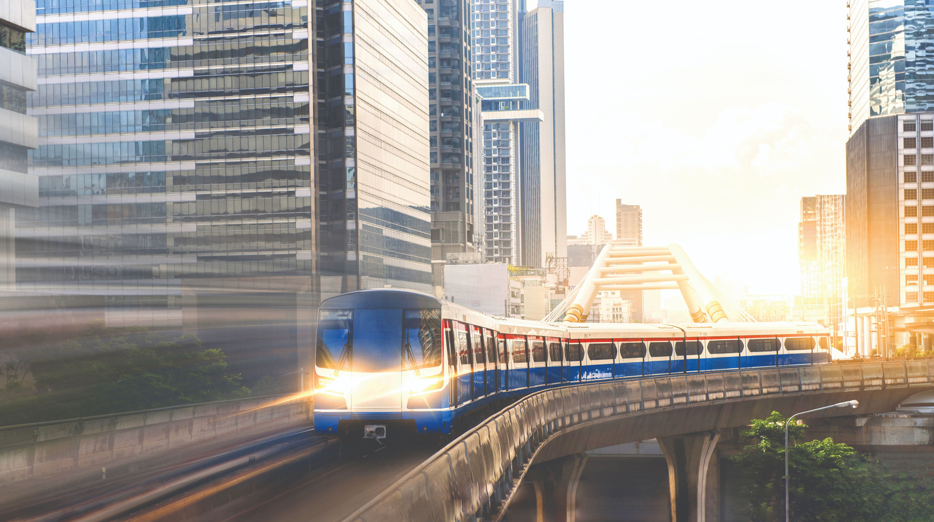 bts-skytrain-electric-train-running-way-with-business-office-buildings-background-compressed-1-.jpg
