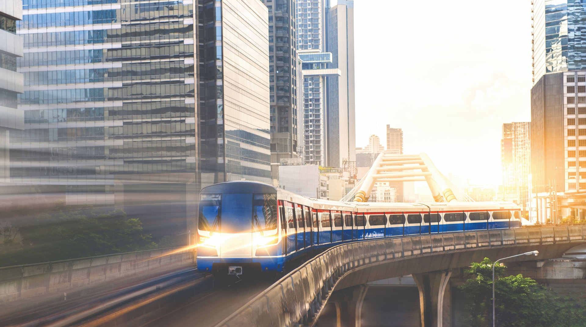 bts-skytrain-electric-train-running-way-with-business-office-buildings-background-compressed-1-.jpg