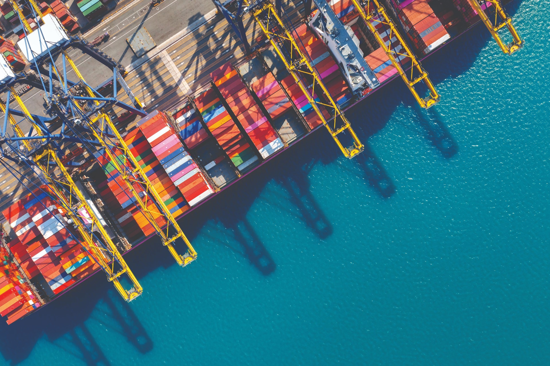 aerial-view-cargo-ship-cargo-container-harbor-compressed.jpg