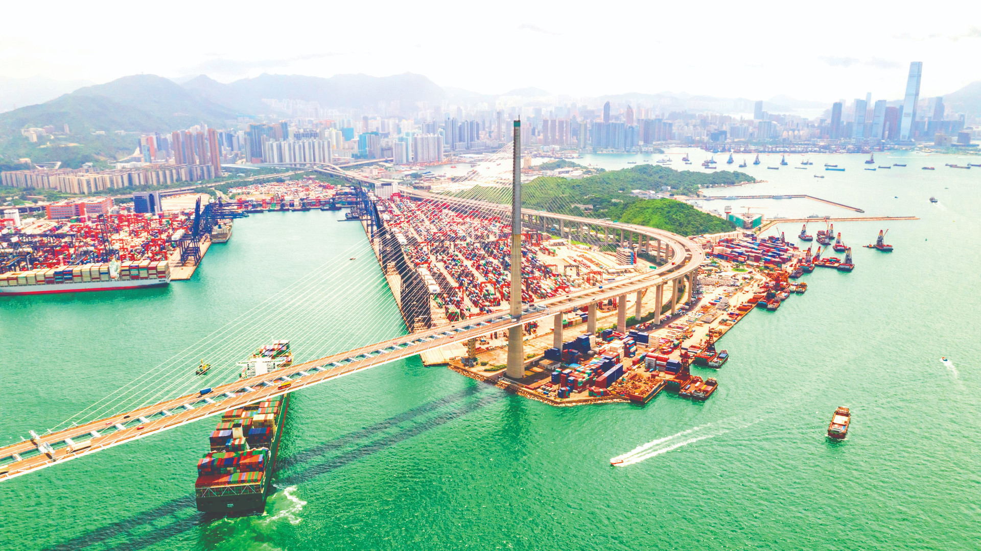 hong-kong-port-industrial-district-with-cargo-container-ship-stonecutters-bridge-compressed.jpeg
