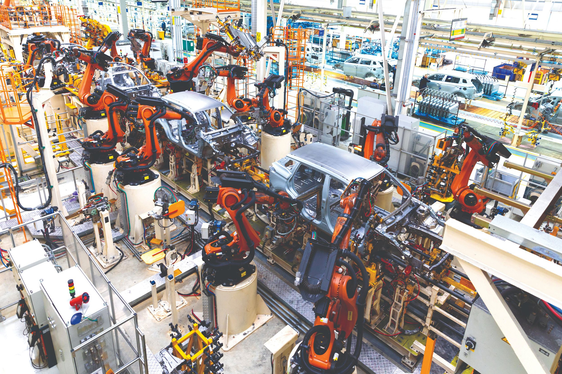 car-bodies-are-assembly-line-factory-production-cars-modern-automotive-industry-electric-car-factory-conveyor-compressed.jpeg