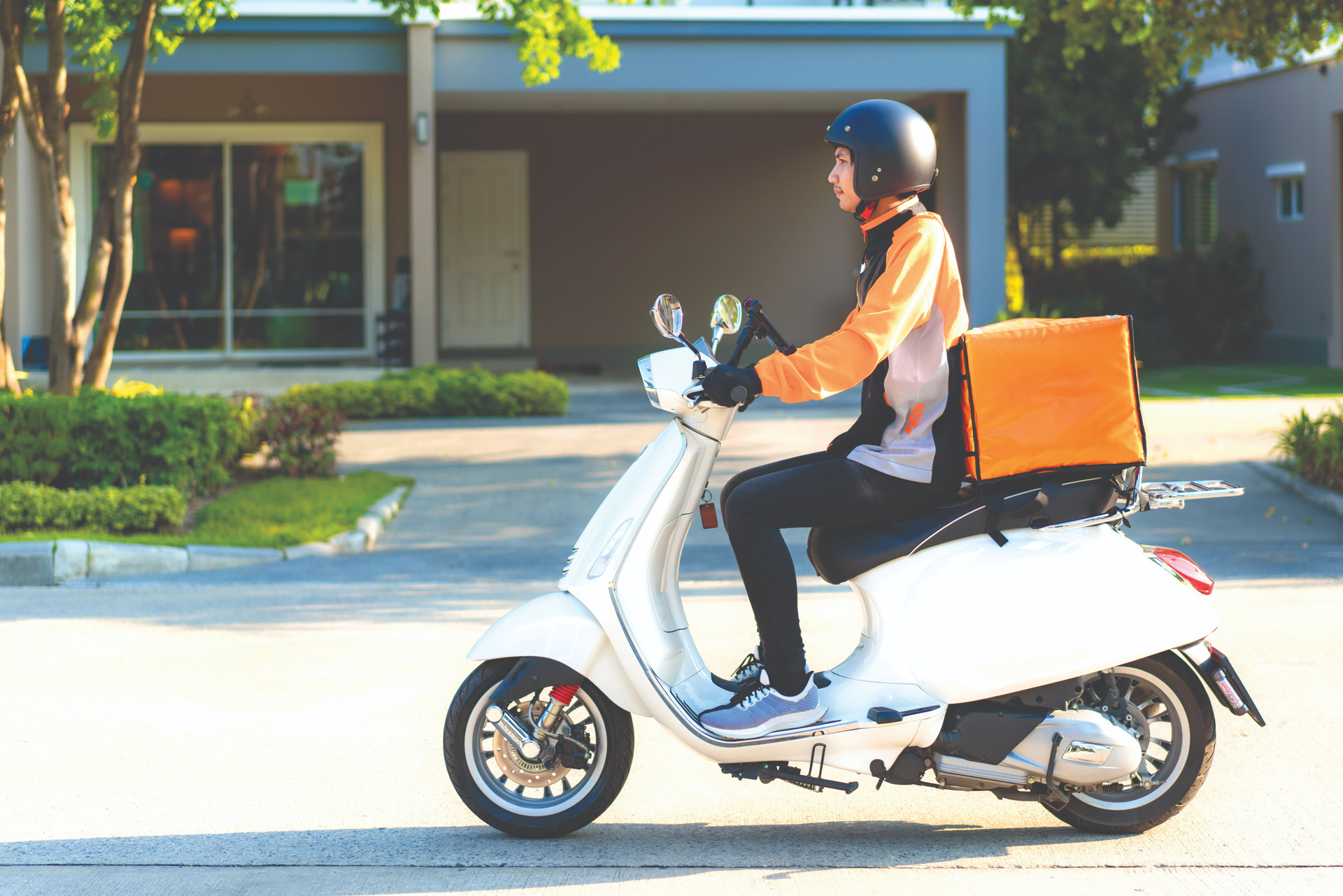 asian-man-courier-scooter-delivering-food-town-streets-with-hot-food-delivery-from-take-aways-restaurants-home-express-food-delivery-shopping-online-concept-compressed.jpeg