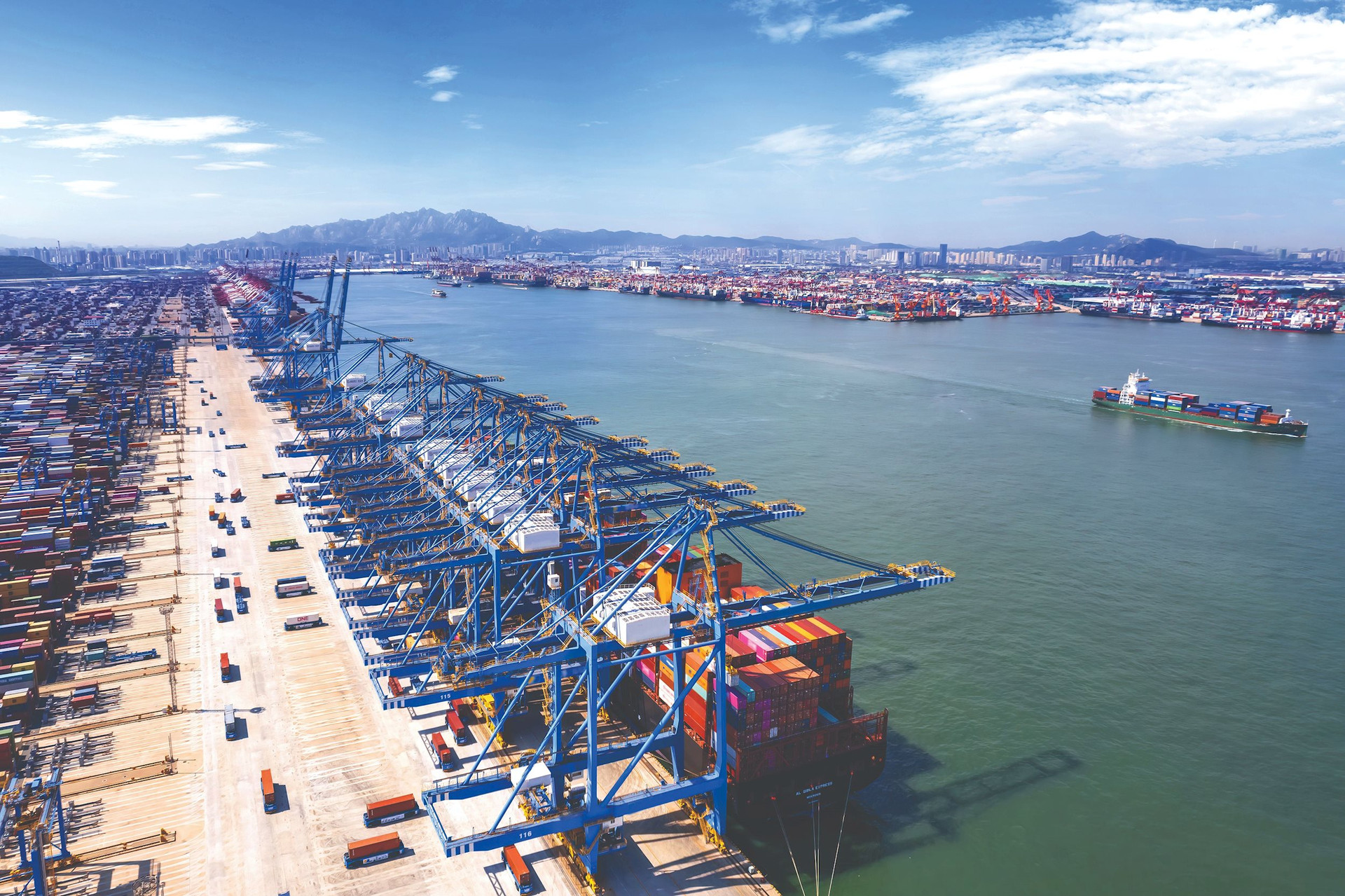 dock-cranes-loading-containers-trade-port-shipping-compressed.jpeg