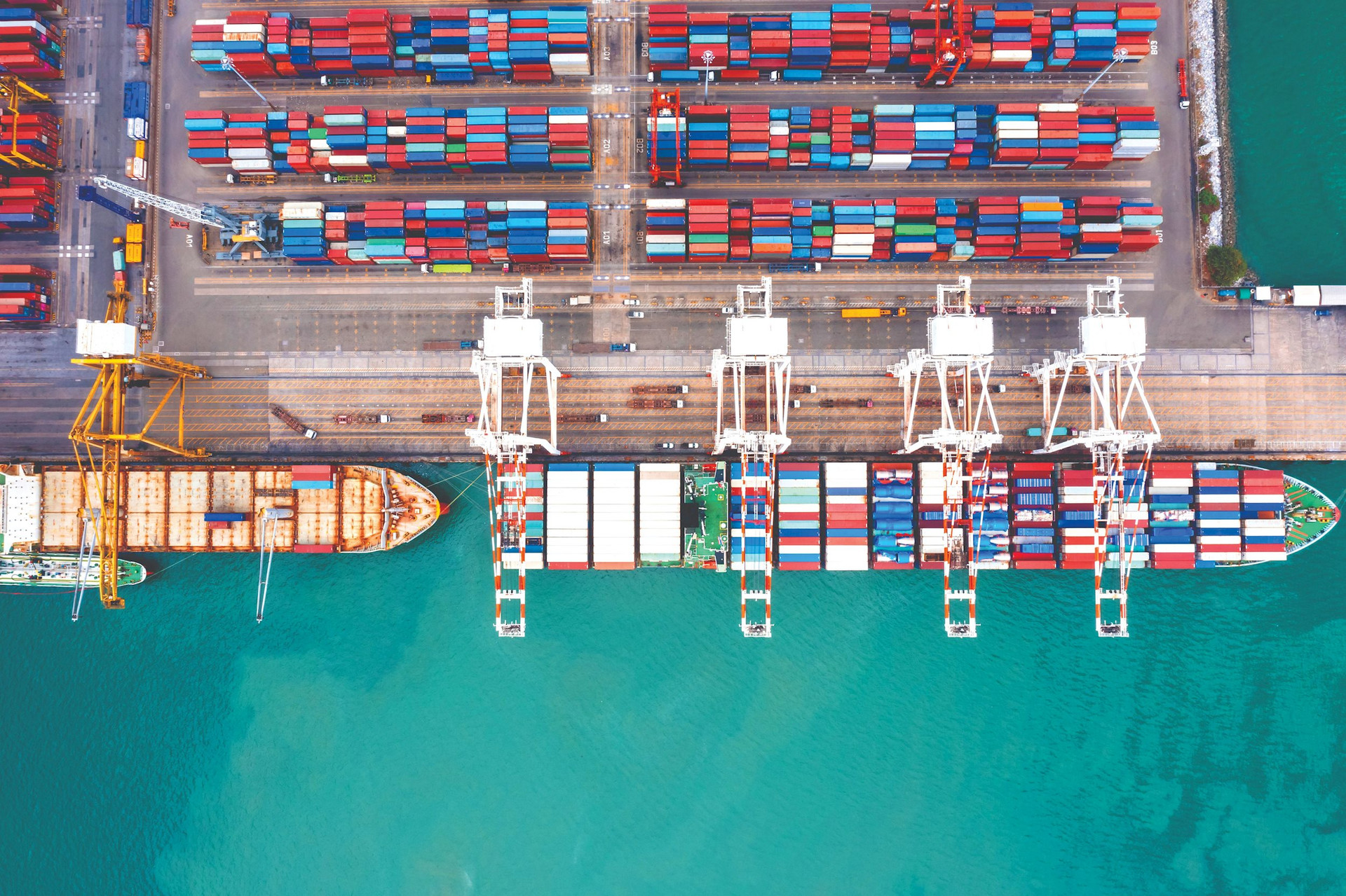 container-ship-load-unloading-container-via-crane-logistics-import-export-goods-compressed(1).jpeg