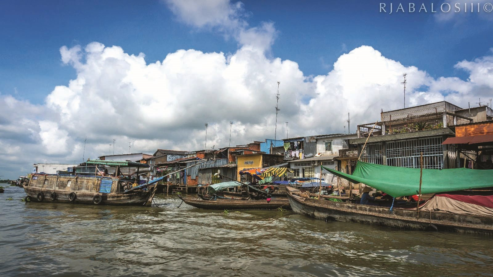 cai-be-floating-market-tien-giang-province-vietnam.jpg