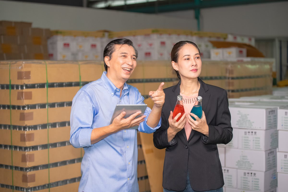 factory-manager-talking-with-quality-control-team-food-factory-food-quality-business-export-customer-factory-manager-with-worker-employee-checking-inventory-stock-wearhouse-1-.jpg