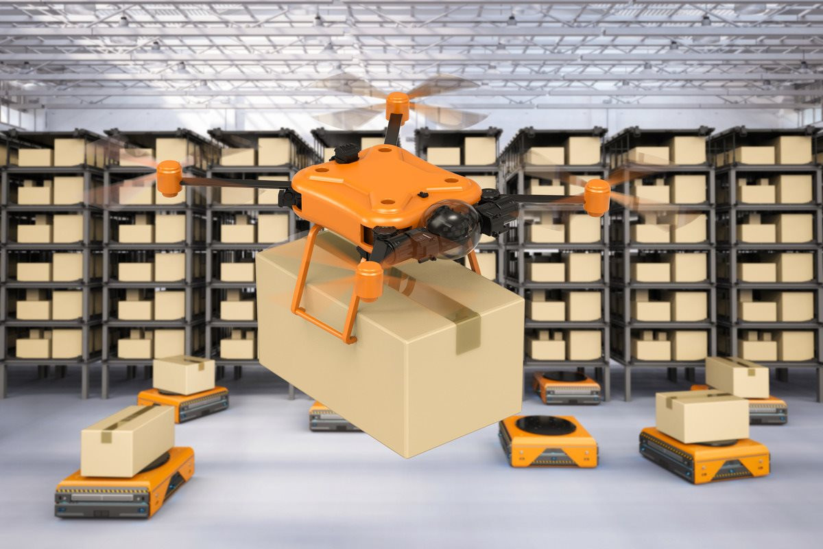 automation-warehouse-concept-with-3d-rendering-delivery-drone-holding-cardboard-box-warehouse-robot-1-.jpg