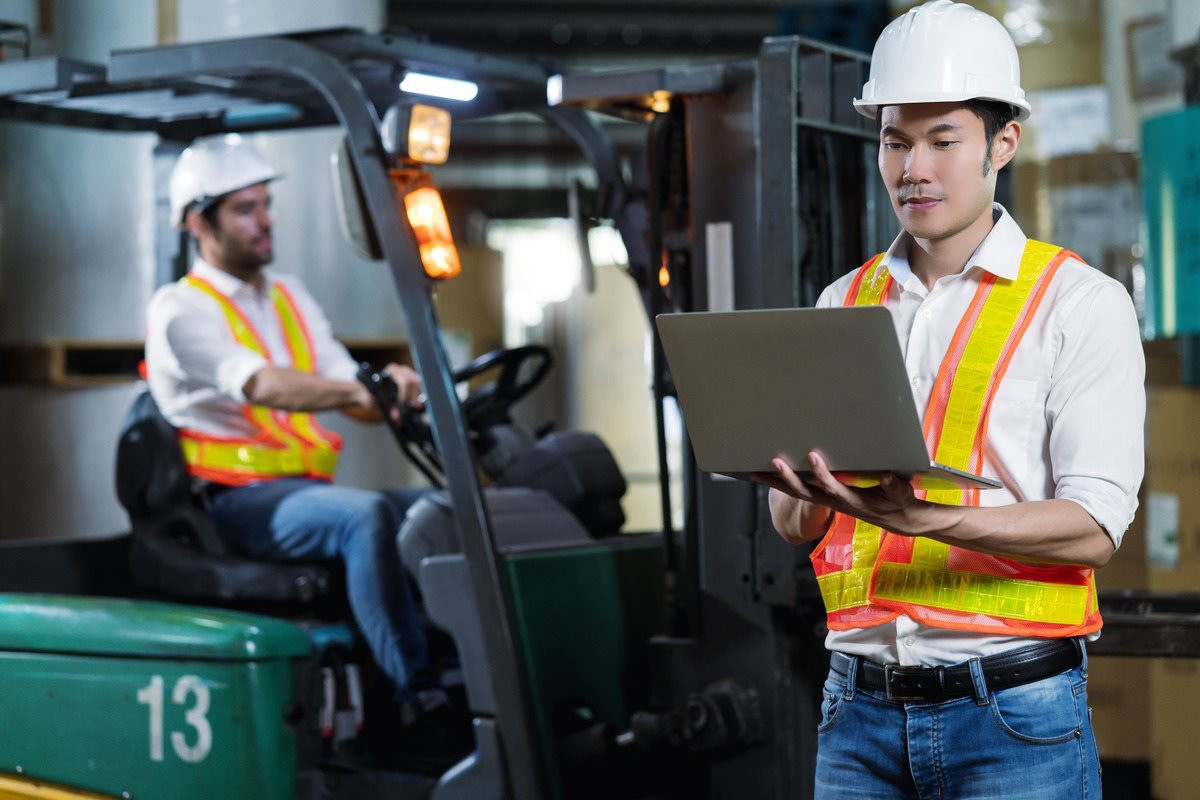 engineer-staff-male-warehouse-worker-hard-hat-working-walking-through-logistics-center-warehouse-factory-construction-site-logistics-architect-forklife-driver-man-builder-indoors-background-1-.jpg