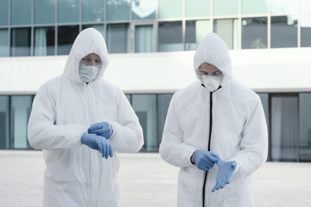 people-wearing-prevention-suits-against-bio-hazard-1-.jpg